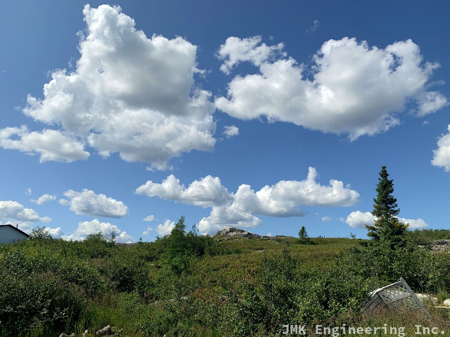 a green hill with the perfect angle for a solar site.